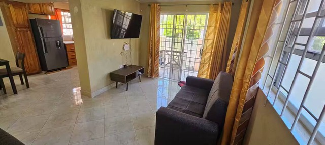Peaceful 2-bedroom downstairs apartment walking distance to the airport. in Hopefield