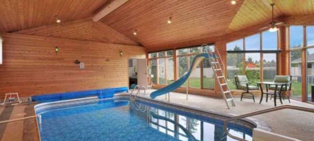 Relaxing Stay: Your Own Pool, Hot Tub, Gazebo, Gym & More! in Lacombe
