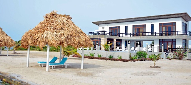 Seafront, 4 bedroom private villa, 10 guests, family vacation, activities nearby in Ambergris Caye